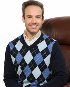 Photograph of appraiser Patrick Kearney seated in a chair